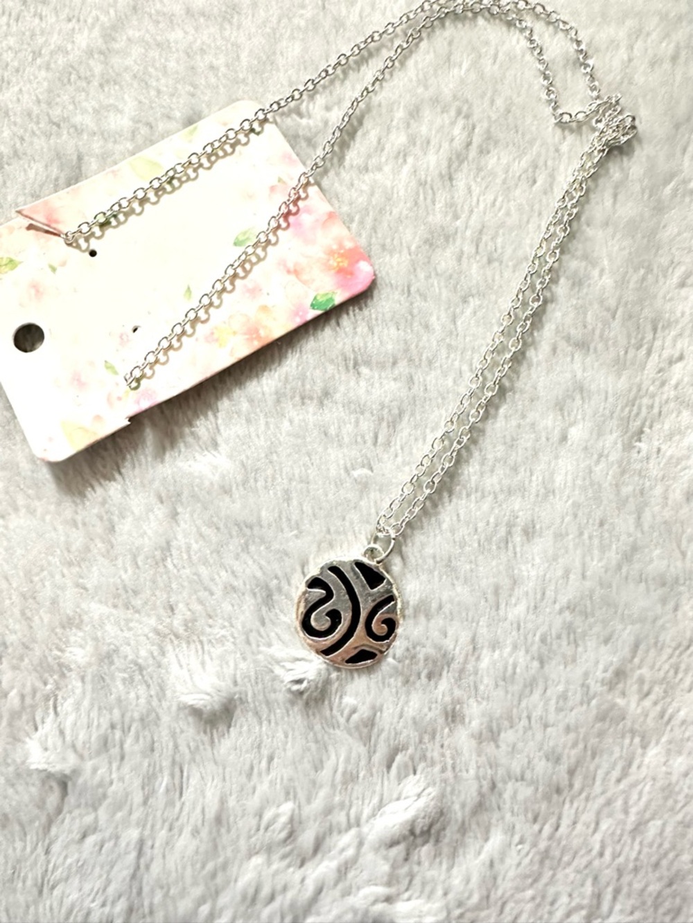 Silver Tone Swirl Pendant Necklace - Black Accent